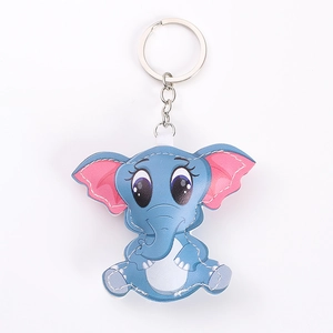 Blue PU leather elephant keychain with white stitching and metal ring on white background