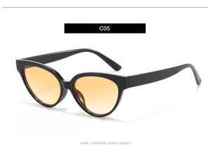 Detail of retro small square cat eye sunglasses with black frame and orange gradient lenses
