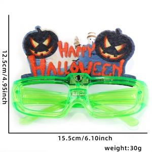 Detail view of LED Halloween glasses with green pumpkin frames and size dimensions