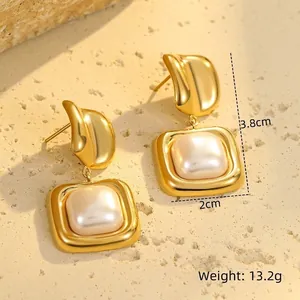 Detailed view of french style gold pearl drop earrings with dimensions 3.8cm height