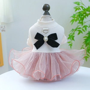 Close-up of pet wedding dress with velvet bow, pearls and soft layered tulle mesh