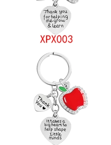 Detail of Teacher Appreciation keychain with red apple charm and Thank You heart pendant