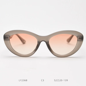 Close-up of cat-eye sunglasses LY2368 C3 with tea grey frames and gradient pink lenses