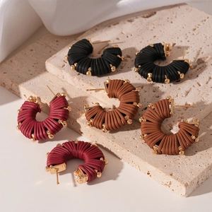 Maillard style C-shaped faux leather striped earrings with gold accents in three colors