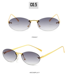 Detail of rimless gold metal oval sunglasses with gradient grey-purple lenses and nose pads