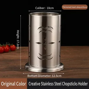 Macro view of stainless steel utensil holder with heart cutouts and size dimensions