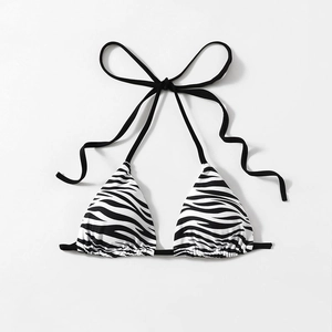 Women's halter bikini top with black and white zebra print and adjustable ties