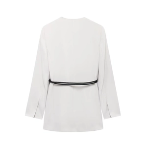 Back view of a light grey V-neck blazer with a slim black belt and split cuffs detail