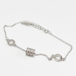 S925 sterling silver beaded bracelet with sparkling central cylinder pendant on white background