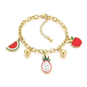 Golden fruit charm bracelet with dragon fruit and watermelon enamel pendants