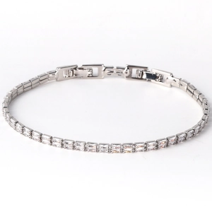 Detailed close-up of a silver tennis bracelet with double-row rectangular zircon stones