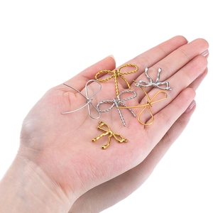 Gold and silver stainless steel butterfly pendants for DIY jewelry making on hand