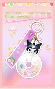 Detail view of Sanrio Kuromi donut liquid oil keychain with pink silicone wrist strap