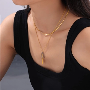 Double-layered 18k gold plated titanium necklace with geometric tag pendants and zircon