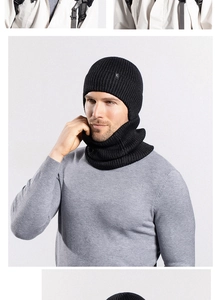 Close-up of black ribbed knit balaclava showing hood and neck warmer details
