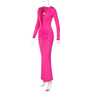 Detail of deep V-neck and ruched waist on a rose red long sleeve maxi dress