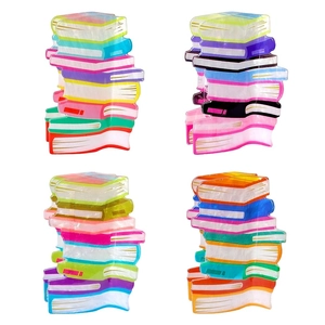 Stack of colorful book-shaped acrylic hair claws for ponytail styling on white background