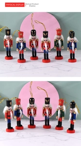 Detail of six handcrafted 10cm wooden nutcracker soldiers with gold hanging strings