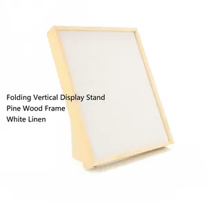 Vertical pine wood folding jewelry display stand with white linen panels for earrings and rings