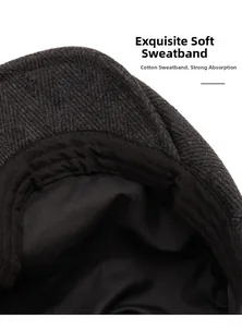 Detail of the soft inner sweatband and premium herringbone fabric of the newsboy cap