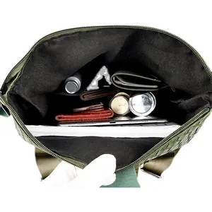 Deep green woven backpack with spacious black lining for tablet and daily essentials