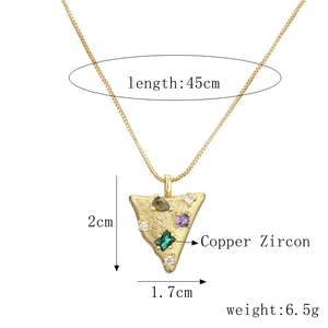 Detail showing dimensions of gold heart pendant with colorful zircon stones and copper chain