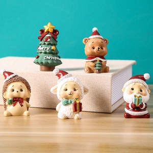 5-piece resin Christmas family figurines set including Santa and animals for desk decor