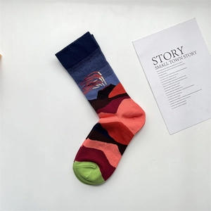 Detailed close-up of a high-quality cotton sock with an abstract mountain jacquard pattern