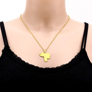 Golden Venezuela map pendant necklace in stainless steel shown on a fashion model