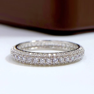 Macro shot of S925 silver ring featuring multi-row pave-set zircon stones