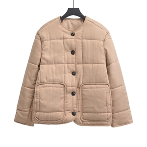 Women's khaki quilted jacket featuring long sleeves, round neck, and front pockets
