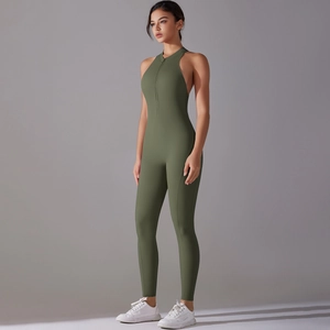 Detail view of high-stretch sports jumpsuit with front zipper in olive green color