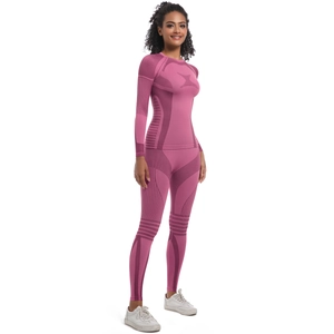 Detail of seamless rose purple yoga set showing striped texture and sculpting compression