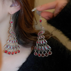 Vintage peacock tassel drop earrings with red rhinestones and silver finish for women