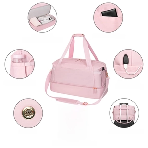 Pink travel bag detail showing shoe compartment, USB port and luggage strap features