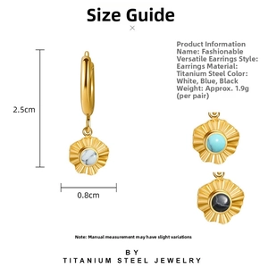 Detailed view of 2.5cm starburst earrings in gold steel with marble stone insets