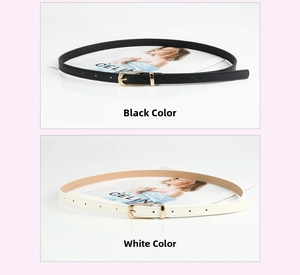 Close-up detail of minimalist black and white PU leather belts with gold metal buckles