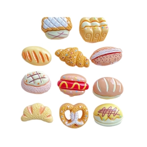 Set of 11 miniature resin bakery charms including croissants and hot dogs for DIY crafts