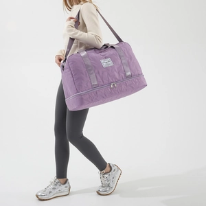 Purple star-quilted fitness travel bag with large capacity and adjustable shoulder strap