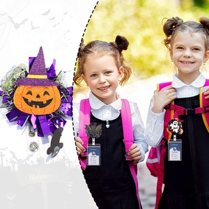 Halloween retractable ID badge reels featuring pumpkin, ghost and bat party decorations