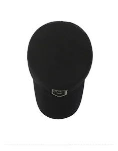 Top view of a black flat top military cap featuring a vintage shield embroidery badge