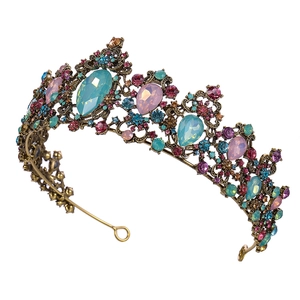 Vintage gold bridal crown featuring colorful rhinestones and elegant baroque design