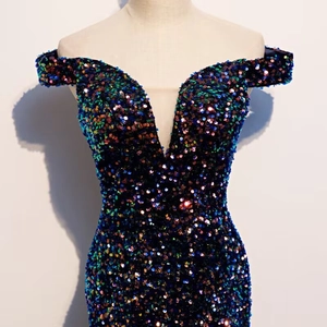 Elegant off-the-shoulder sequined long evening gown with deep V-neck and mermaid silhouette