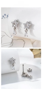 Detail view of star-shaped earrings with zircon drop and threaded screw-back closure