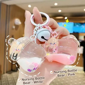 Porte-clés créatif en biberon avec ours flottant liquide en blanc et rose mignon