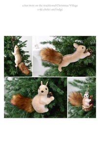 Detail of plush squirrel Christmas ornaments with faux fur tails and pine cones