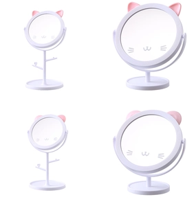 Detail view of a white cat-eared desktop makeup mirror with 360-degree rotating stand