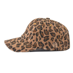 Distressed leopard print baseball cap with washed vintage canvas and ripped hole details