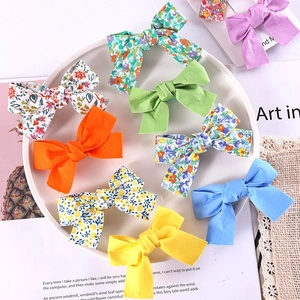 8-piece set of cute floral and solid color cotton fabric bow hair clips for girls