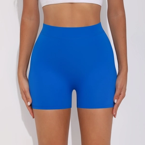 Detailed close-up of high-waisted royal blue yoga shorts with smooth elastic fabric